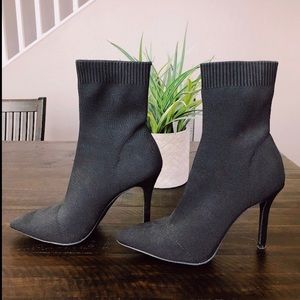 Black heeled sock boots